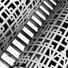 Abstract detail van gebouw in zwartwit. Lijnen en vormen van Marianne van der Zee