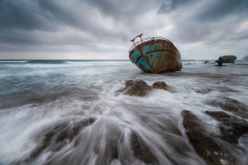 Rusting Shipwreck on a Wild Rocky Shore