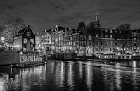 Cruising along the Sluyswacht in Amsterdam (b&w) by Jeroen de Jongh Photography thumbnail