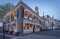 Old cafe in Zwolle Overijssel in the evening with the tower in the background. by Bart Ros thumbnail