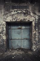 Beautiful blue door in an abandoned factory in France