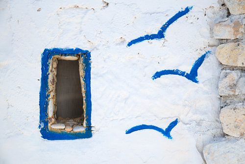 Wit met blauwe Griekse muur