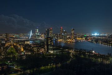 The skyline of Rotterdam with a lighted De Kuip