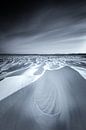 Snowdunes in the National Park Lauwersmeer in Groningen after a snowstorm in black and white. The be by Bas Meelker thumbnail
