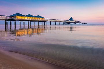 Pier in the sunrise by Martin Wasilewski
