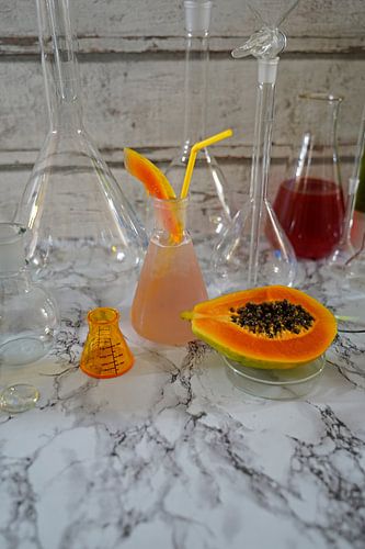 Gin cocktail met papaya en limoen