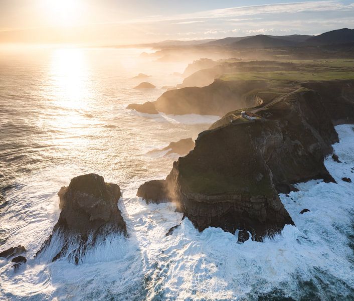 Lighthouse on top the rugged coastline! by Peter Haastrecht, van