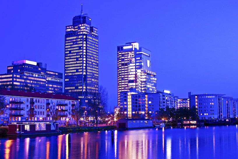 Skyline of Amsterdam in the Netherlands with sunset by Eye on You