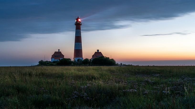 Westerheversand lighthouse at night by Jens Sessler