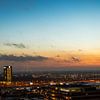 Sunset over the skyline of Nieuwegein with the broadcasting mast as Christmas tree by Bart van Lier