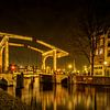 Bridge over the canal in Amsterdam by Sandra Kuijpers