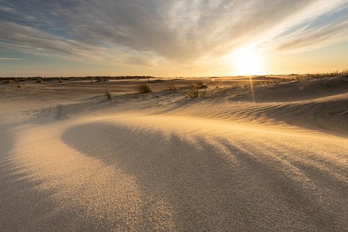 Zonsondergang op het strand van Zeeland