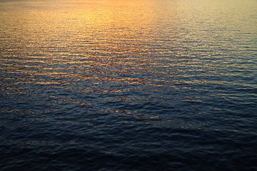 Evening red reflecting in the sea by Floris Verweij