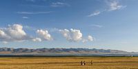Kids playing on the shores of Song Kol Lake