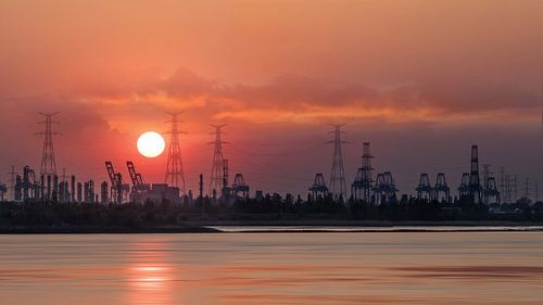 Panorama with sunset and view on a quay in Port of Antwerp