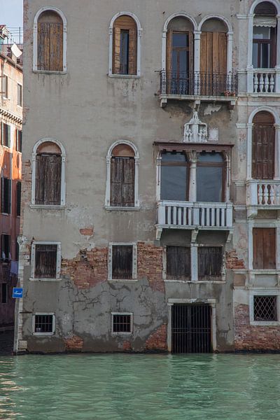 Old buildings by the canal in the old centre of Venice, Italy by Joost Adriaanse