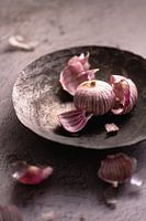 Garlic bulb on tin dish