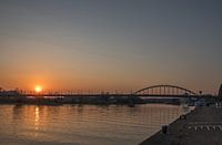 Setting sun at the John Frost Bridge