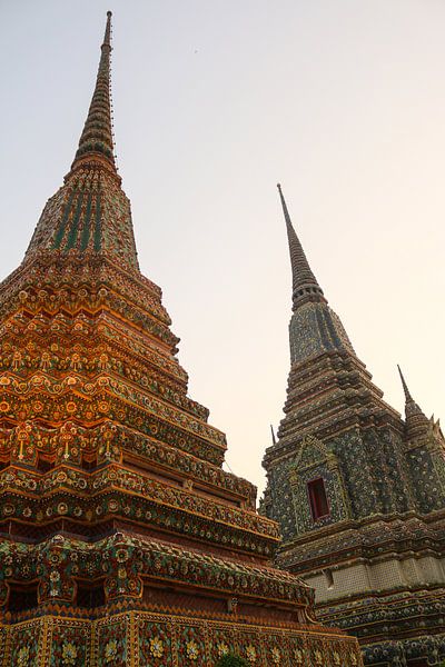 Third view of two stupa against sky at Wat Pho by kall3bu