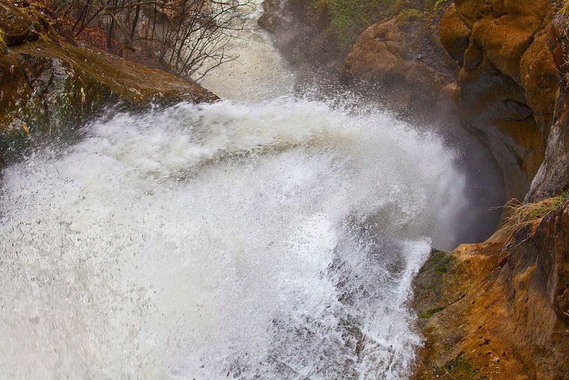 Waterfall through a rock by Christa Kramer