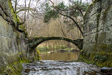 Old stone arch bridge between rocks 2 by Holger Spieker