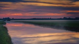 Polder Sonnenuntergang von Robbert Ladan