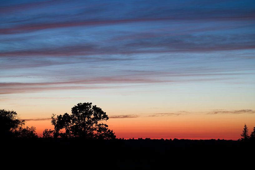 Coucher de soleil avec un magnifique jeu de couleurs - 3 par Tim Emmerzaal