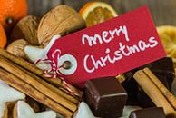 Kerstkoekjes, chocolaatjes, noten, sinaasappels en kaneel van Alex Winter thumbnail