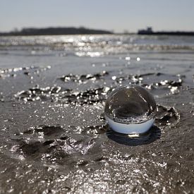 Glaskolben am Strand von Fotografiemetangie