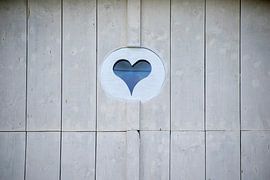 Heart in French wooden door by Eline Bouwman
