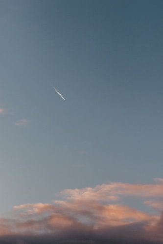 Airplane. Sky. Sunset. Pastel colors. Fine art photography.
