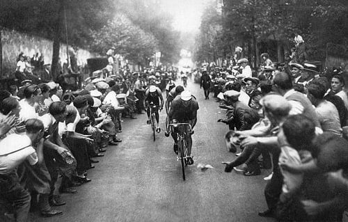 Tour de France cyclists and cheering crowd by Bridgeman Images