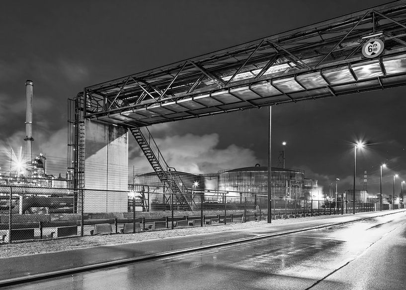 Rainy night with refinery and large pipeline bridge, Belgium by Tony Vingerhoets