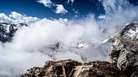 mountain peaks in the clouds