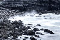 Rotsen in de branding