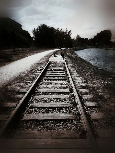 Children playing on the traintracks by Elo Mars