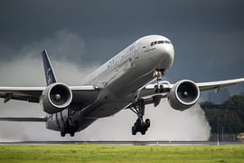 Garuda SkyTeam 777 spray take-off by Dennis Janssen