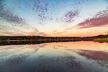 Midnight above the Arctic Circle in Sweden by Hidde Hageman