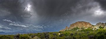 Landscape with looming clouds and eroded mountains. New Zealand by Albert Brunsting