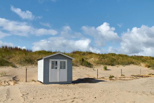 Beach cabin against the dunes by Ad Jekel