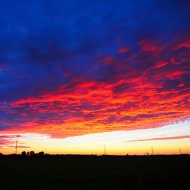 Zonsondergang bij Groningen van Nicky Langeslag