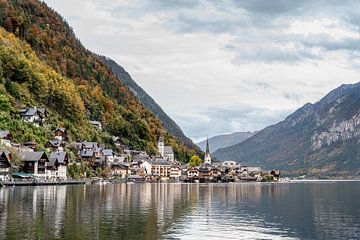 Hallstatt Austria by the water between the mountains by Esmé Gernette
