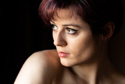 Fashion portrait of a 23 year old white woman with short, dyed h