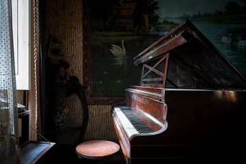 Abandoned Piano in the Dark.