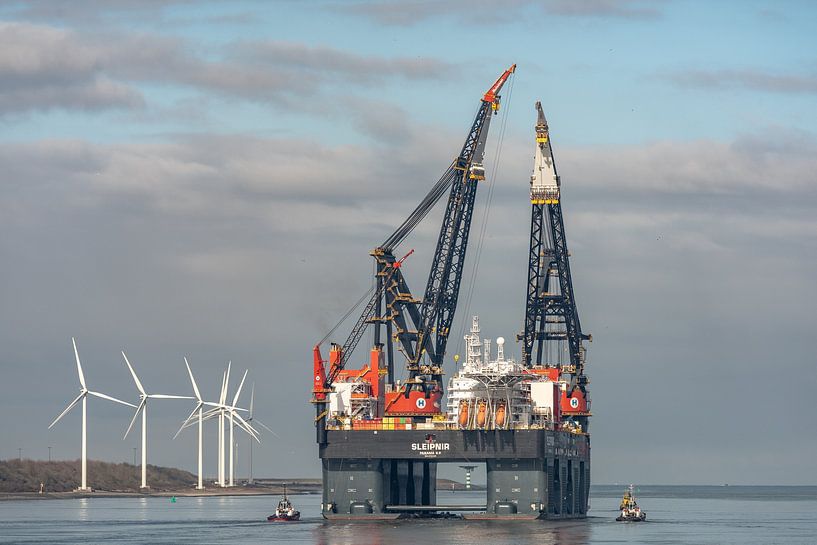 The largest crane ship in the world, the Sleipnir, leaves the port and is on its way to a new job at by Jaap van den Berg