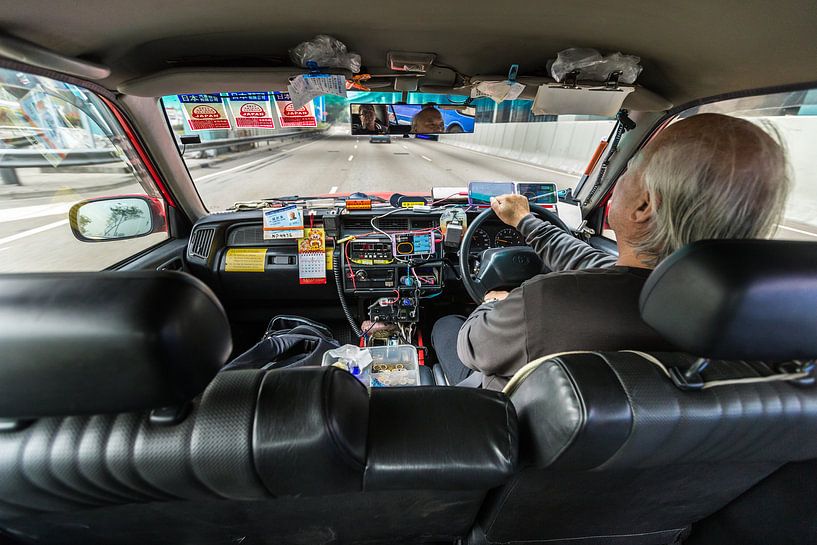 Hong Kong taxi by Inge van den Brande