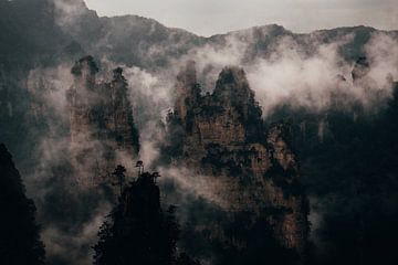 Fog through the mountains by Fulltime Travels