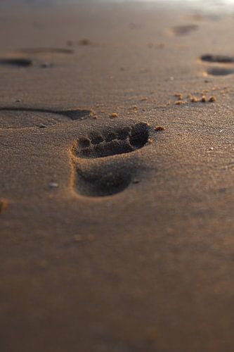 Une empreinte de pied dans le sable