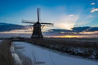 Mühle und Sonnenaufgang