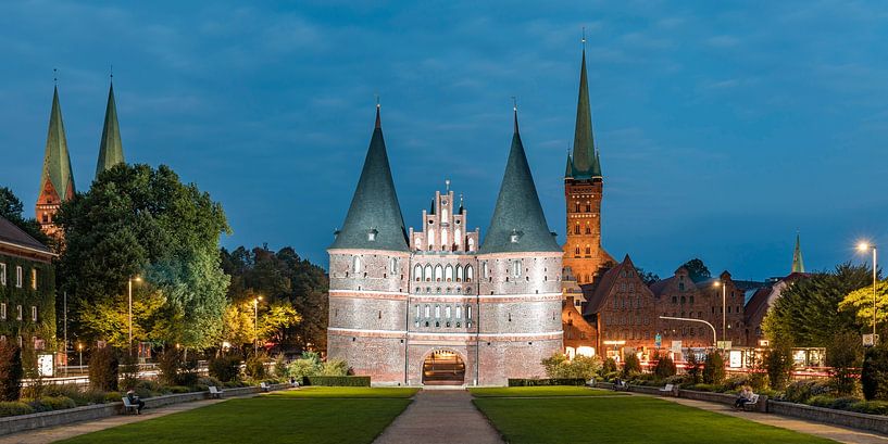 Holsten Gate in Lübeck by night by Werner Dieterich